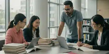 Graduate students studying in a library, discussing academic work and financial aid options for 2025.